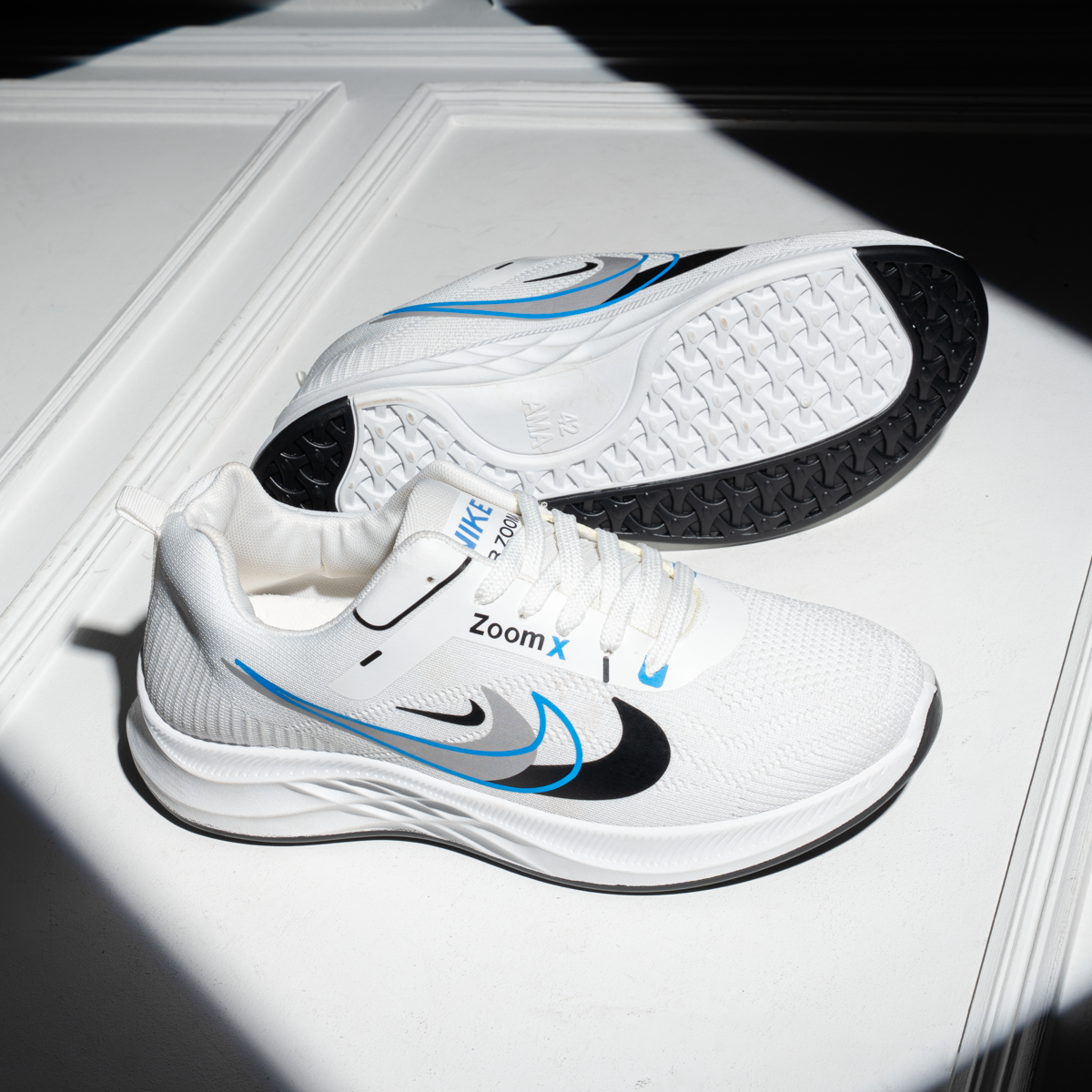 NIKE Air Zoom Lightweight Sneakers